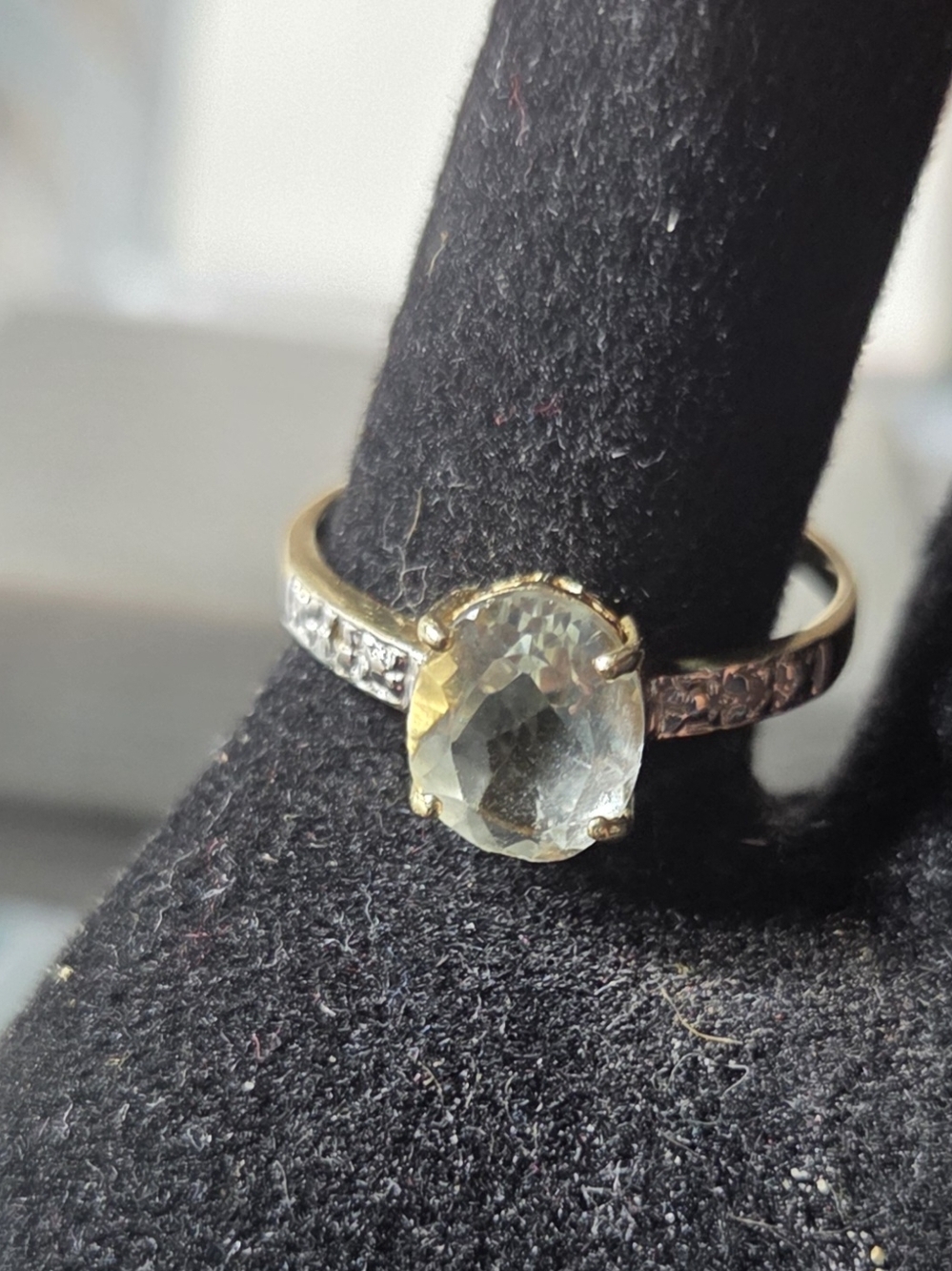 Gold Ring with Pale Green Oval Gem and Accent Stones
